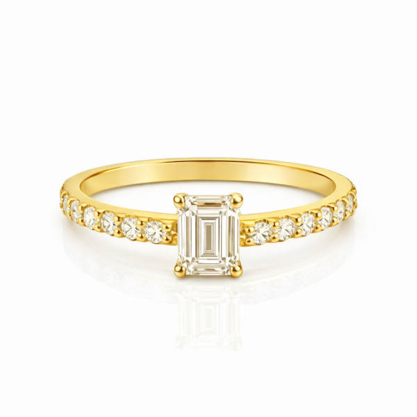 Ring Solitär mit Diamant 0,20ct Tw/vs (Emeraldcut) und Brillanten zus. 0,25ct Tw/si, 750/- Gelbgold